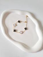 Load image into Gallery viewer, Black &amp; White Clover Bracelet
