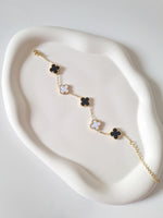 Load image into Gallery viewer, Black &amp; White Clover Bracelet
